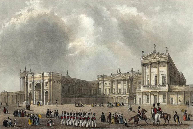 A coloured engraving of Buckingham Palace. In the foreground there are multiple small groups of people overlooking the palace. To the right of the front are three King's Guard on horses. In the middle of the foreground there two lines of Kings Guard walking in formation. Behind this stands the towering Buckingham Palace. The sky above is moody, grey and cloudy.
