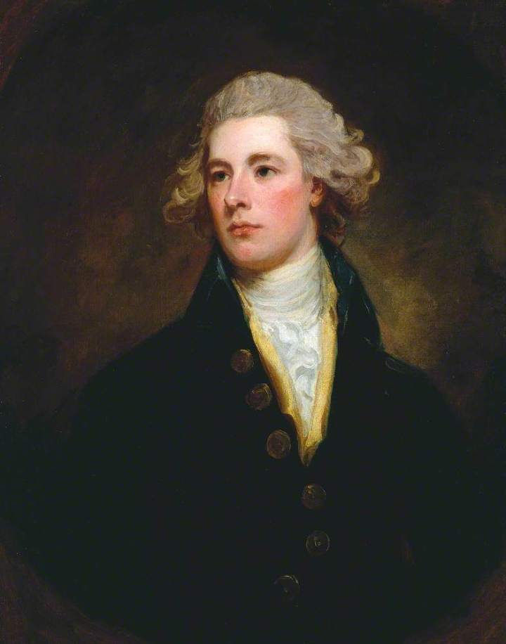A half-length portrait of William Pitt the Younger. He is wearing a dark blueish jacket with large gold buttons and a high collar, with a yellow silk scarf and white frilled shirt. He is clean shaven, with rosy cheeks and curly grey hair. 
