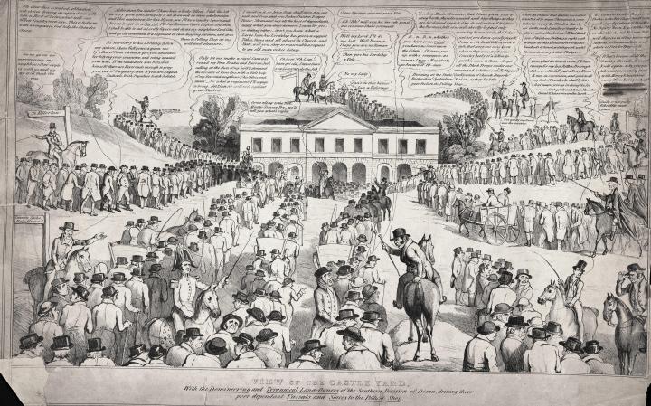 A black and white satirical print titled 'View of the Castle Yard. With the Domineering and Tyrannical Land Owners of the Southern Division of Devon, during their peer dependent Vassals and Slaves to the Polling Shop.' In the middle of the image is a white two story building with nine windows on the first floor and a matching nine arches underneath. from all around the building there are lines of men all adorned in their top hands being led into the building to vote by men on top of horses with whips and weapons in their hands. 
