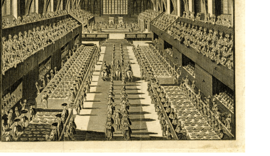 A sepia print of the inside of Westminster Hall during a coronation banquet. On both sides are galleries where people are stood looking down. On the ground is an aisle where two rows of people are walking down and three horses. On the sides of this aisle are long banquet tables that have food on top and people sat around.
